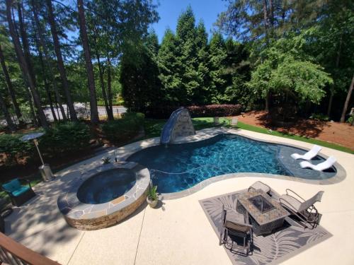 Freeform Pool, Gray Flagstone, Cool decking, Midnight Blue Mini Pebble