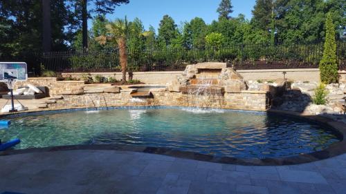 Brown Flagstone, stacked Stone, Ivory Travertine Decking