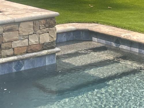 Silver Travertine Bullnose Coping, Black mini Pebble, Decorative Tile, Turf decking