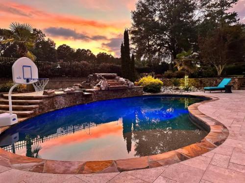 Brown Flagstone and stacked stone, Ivory Travertine Decking