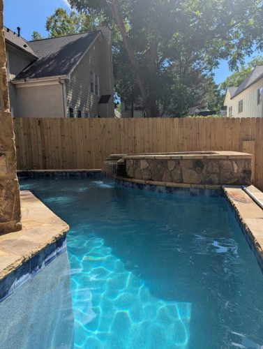 Raised pool/spaFlagstone Coping/wallAqua Blue Mini pebble
